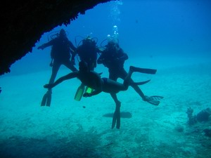 In front of the cave